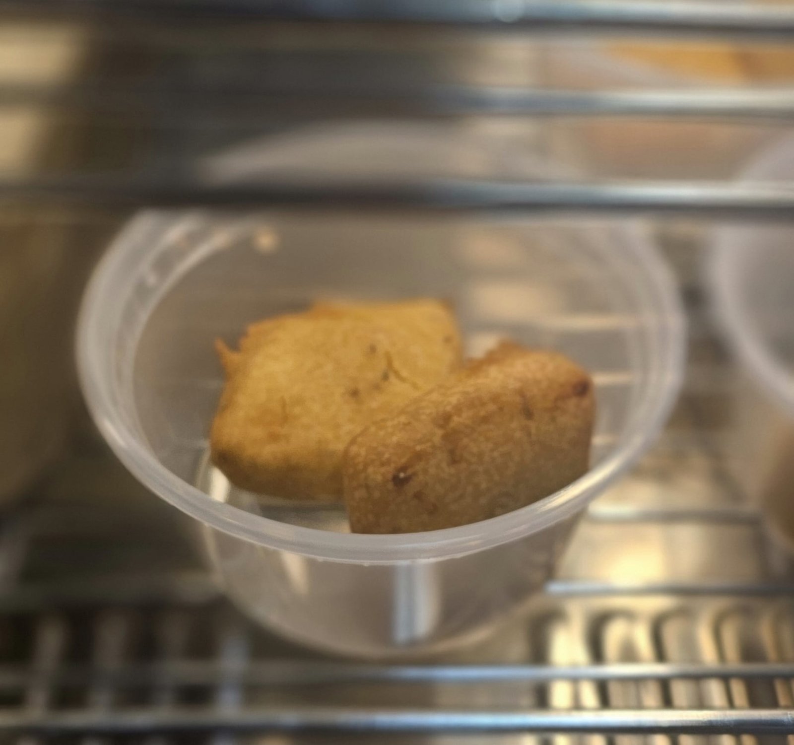 Paneer-stuffed bread pakora, a popular Indian snack, crispy on the outside and creamy inside.