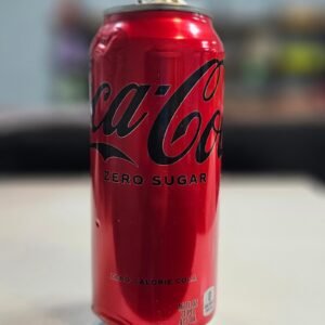 Coca-Cola Zero Sugar can with a sleek design, showcasing its sugar-free refreshment.