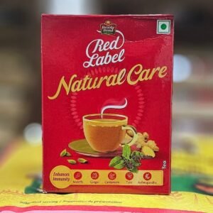 Red Label Natural Care Tea package, 250g, promoting health and wellbeing.