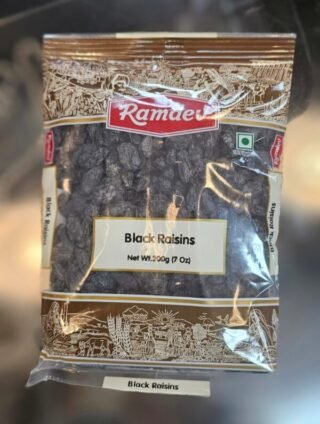 7oz pack of Ramdev black raisins, a healthy dried fruit option.
