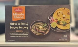 Haldirams Makke Ki Roti with Sarson Ka Saag in a traditional serving dish