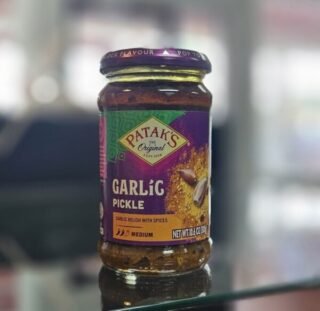 Jar of Patak Garlic Pickle showcasing traditional Indian spices.