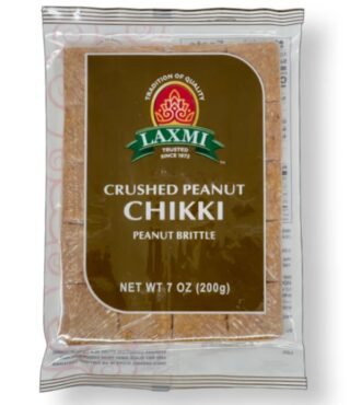 Laxmi Crushed Peanut Chikki in a 7 oz pack, featuring roasted peanuts and jaggery.