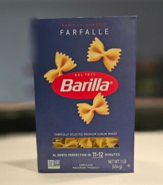 Barilla Classic Farfalle pasta in a 1 lb package, ideal for Italian dishes.
