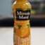 Minute Maid 100% Orange Juice in a clear bottle