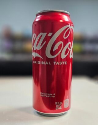 Coca-Cola Original Taste beverage in a bottle