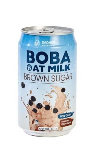Boba Oat Milk Tea with chewy boba pearls in a clear cup