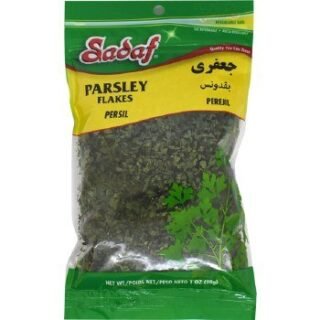Sadaf Parsley Flakes in a 28g package, ideal for enhancing dishes with flavor.